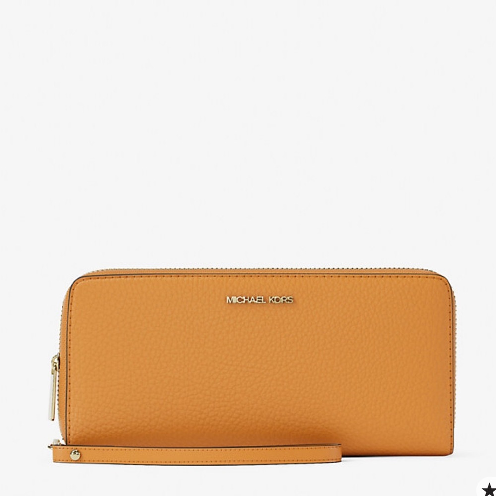 MICHAEL KORS Jet Set Travel Lg Pebbled Leather Continental Wristlet
Rad Orange